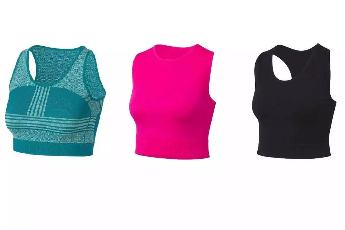 Foto de tres tops cortos deportivos de Lidl en verde, rosa y negro